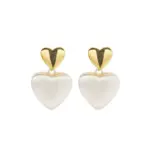 LIVKE’s vintage heart stud earrings with textured gold finish, styled with a denim jacket for casual-chic outfits.