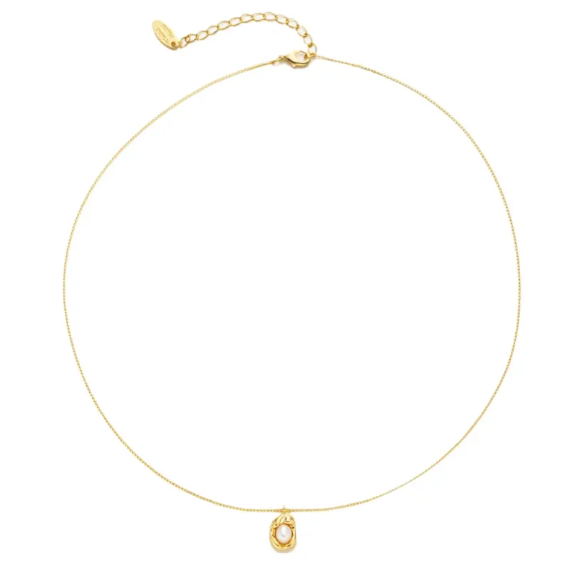 LIVKE’s vintage genuine pearl necklace with 18K gold-plated chain, styled with a black silk dress for timeless elegance.