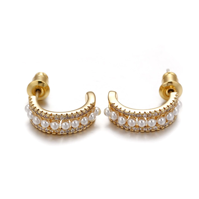 LIVKE’s gold vintage pearl hoop earrings styled with a lace dress for timeless retro elegance.