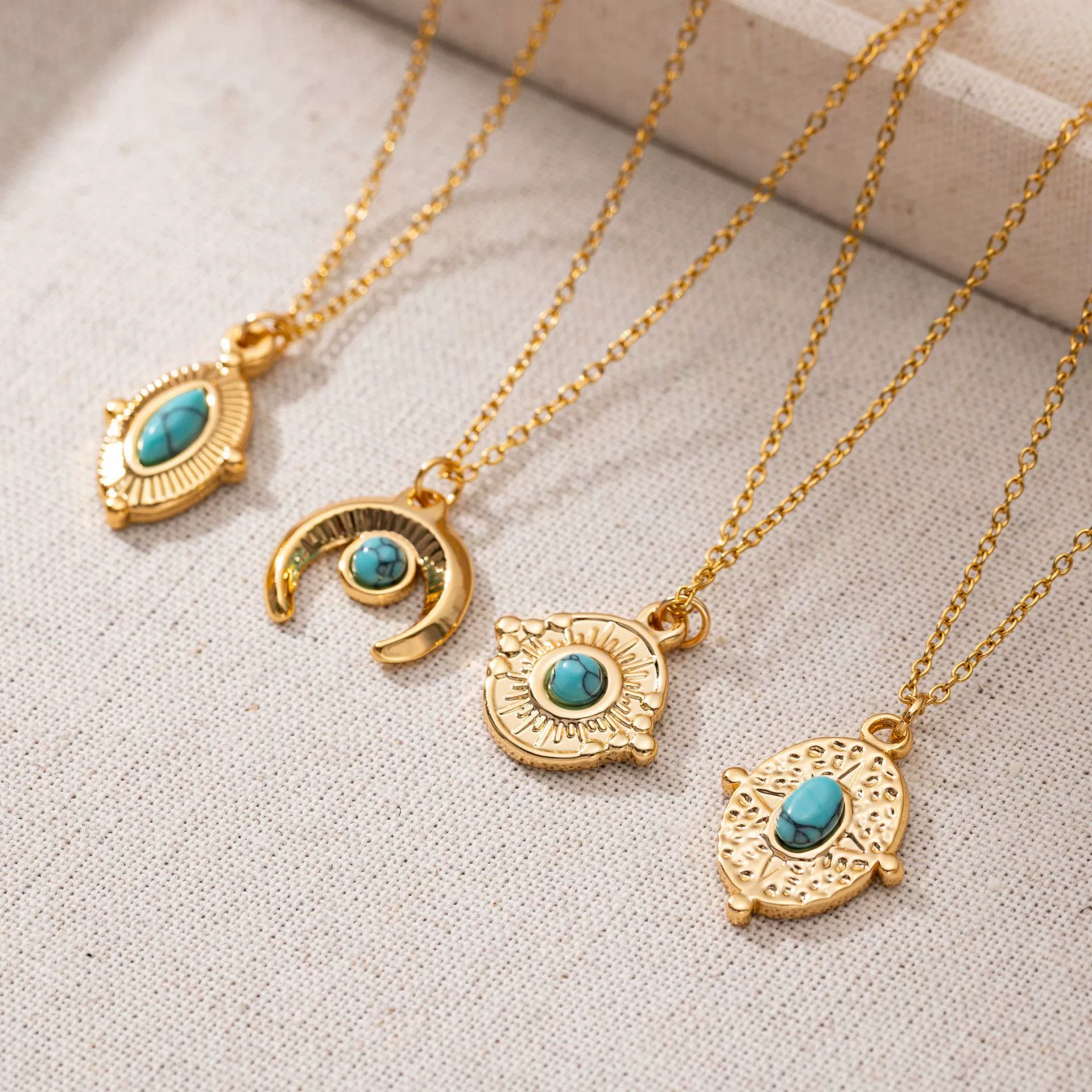 livke-18k-gold-oval-bead-vintage-necklace.jpg (4) LIVKE’s gold oval bead necklace with intricate vintage texture, styled with a black evening gown for royal-inspired elegance.