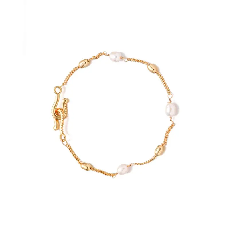 LIVKE’s gold freshwater pearl bracelet styled three ways: wrist, layered, and ankle chain for versatile elegance.