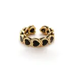 LIVKE’s French-inspired black heart adjustable ring on a hand with black nail polish, styled for edgy everyday elegance.