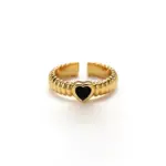 LIVKE’s French-inspired black heart adjustable ring on a hand with black nail polish, styled for edgy everyday elegance.