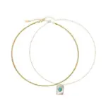 LIVKE’s gold snake chain necklace with shell and turquoise pendant, layered with beaded bracelets for boho summer style.