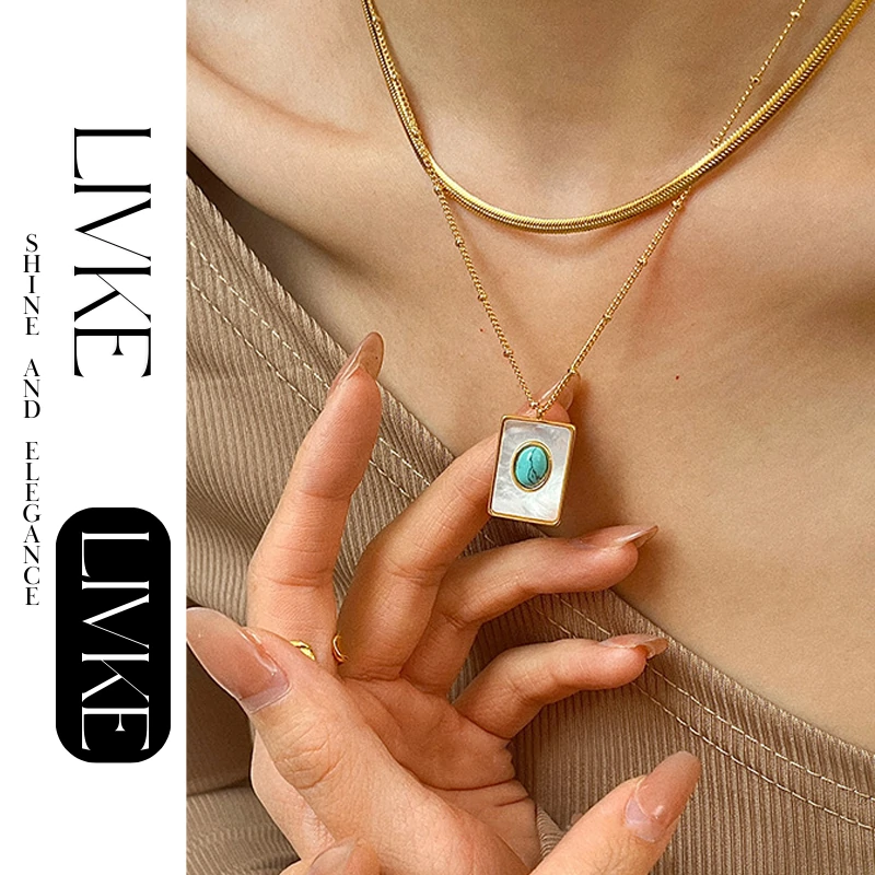 LIVKE’s gold snake chain necklace with shell and turquoise pendant, layered with beaded bracelets for boho summer style.