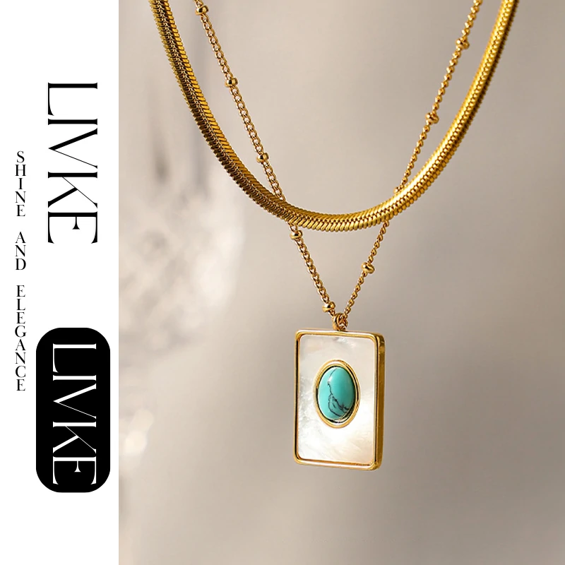 LIVKE’s gold snake chain necklace with shell and turquoise pendant, layered with beaded bracelets for boho summer style.