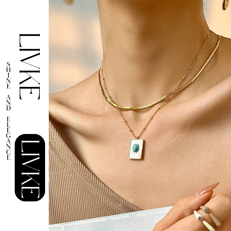 LIVKE’s gold snake chain necklace with shell and turquoise pendant, layered with beaded bracelets for boho summer style.