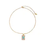 LIVKE’s gold snake chain necklace with shell and turquoise pendant, layered with beaded bracelets for boho summer style.
