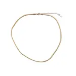 LIVKE’s gold snake chain necklace with shell and turquoise pendant, layered with beaded bracelets for boho summer style.