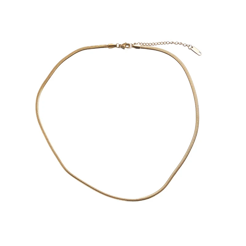 LIVKE’s gold snake chain necklace with shell and turquoise pendant, layered with beaded bracelets for boho summer style.