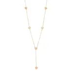 LIVKE’s gold enamel heart pendant necklace styled with a floral dress for Parisian-inspired everyday charm.