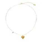 LIVKE’s gold layered heart necklaces styled with a black turtleneck for minimalist everyday elegance.