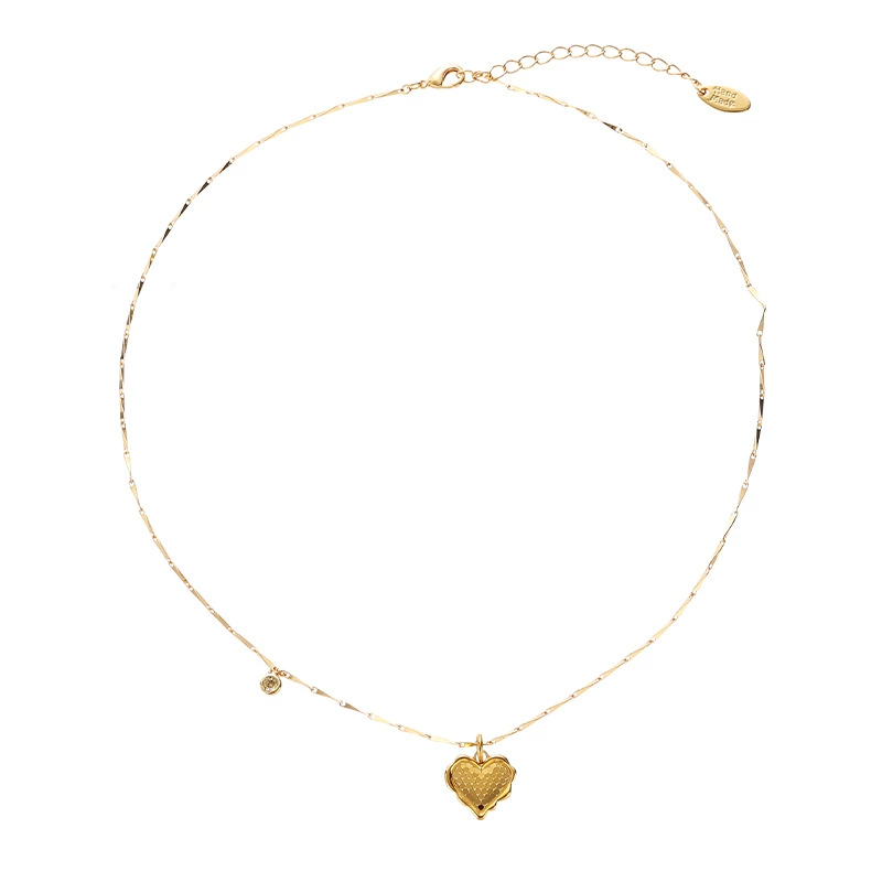 LIVKE’s gold layered heart necklaces styled with a black turtleneck for minimalist everyday elegance.