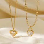 LIVKE’s gold vintage heart necklace with cubic zirconia, layered with a thin chain for minimalist office elegance.
