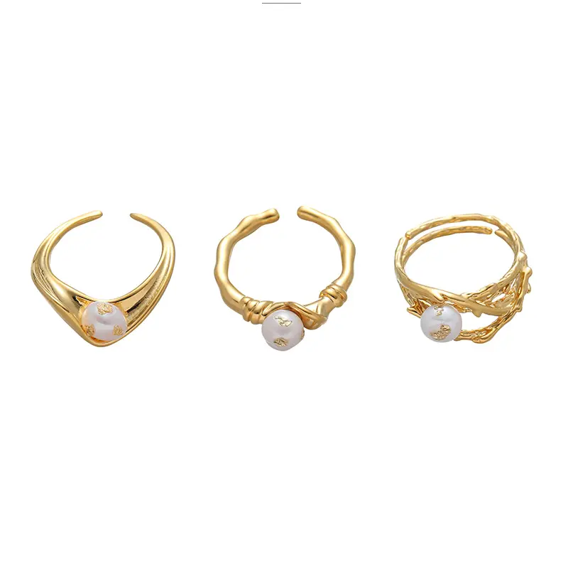 LIVKE’s gold leaf and pearl adjustable ring on a hand with neutral nails, styled with a linen dress for effortless boho elegance.