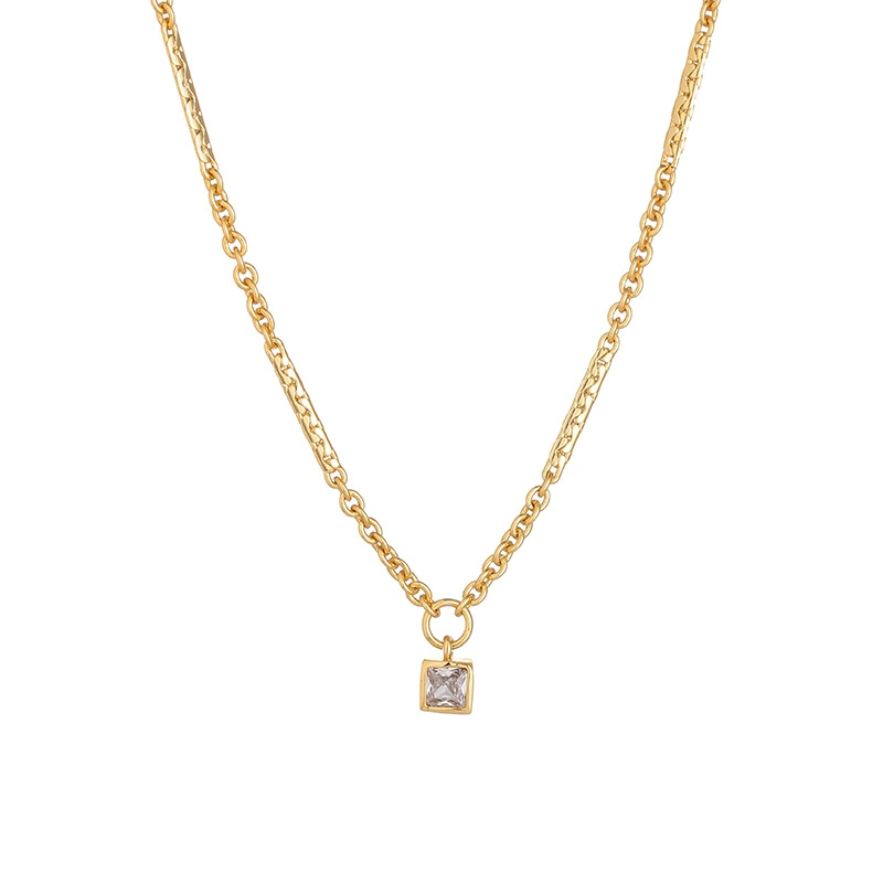 LIVKE’s gold-plated square zircon pendant necklace styled with a white silk blouse for timeless elegance.