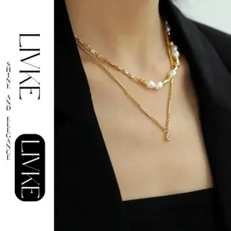 LIVKE’s gold-plated square zircon pendant necklace styled with a white silk blouse for timeless elegance.