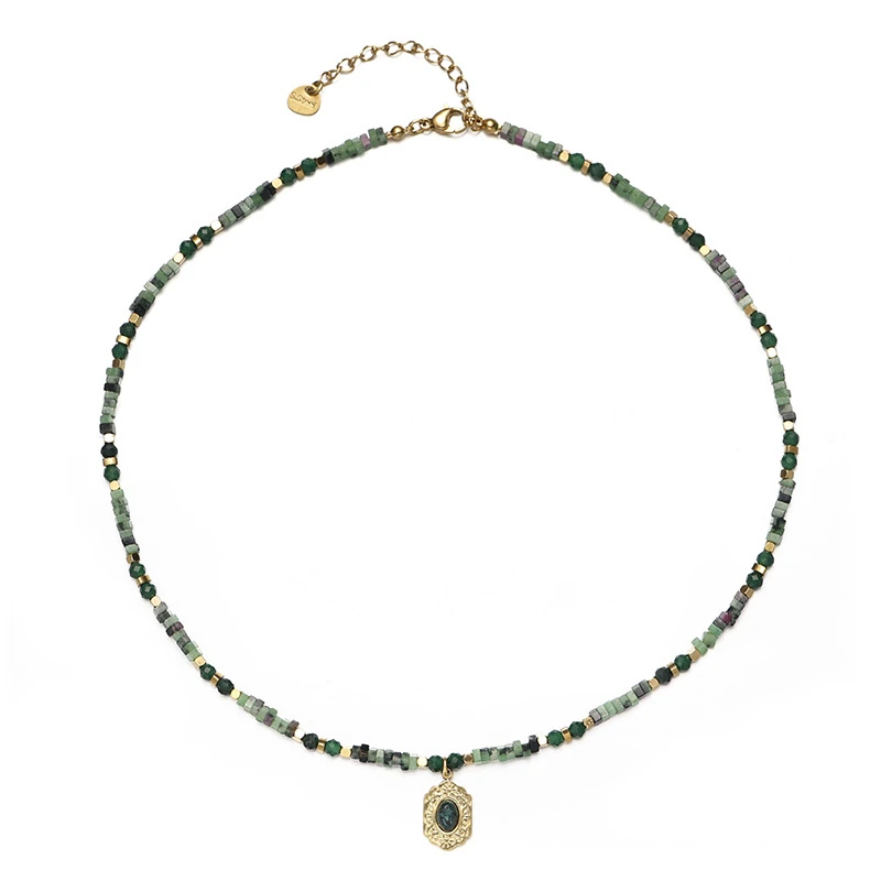 Adjustable LIVKE brass necklace with amethyst and turquoise beads layered over linen dress for bohemian everyday style.