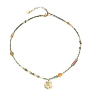 Adjustable LIVKE brass necklace with amethyst and turquoise beads layered over linen dress for bohemian everyday style.