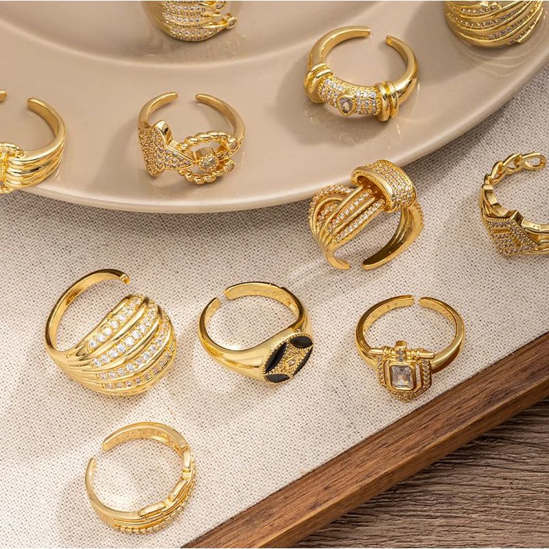 Woman stacking LIVKE textured gold rings with UV color shift effect for TikTok transition video