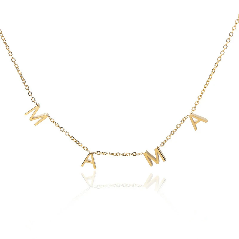 Gold alphabet necklace layered with 4 initials 'LIVK' on collarbone
