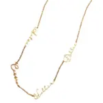 Gold name necklace with 'Believe' engraved in modern font on collarbone