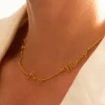 Gold name necklace with 'Believe' engraved in modern font on collarbone
