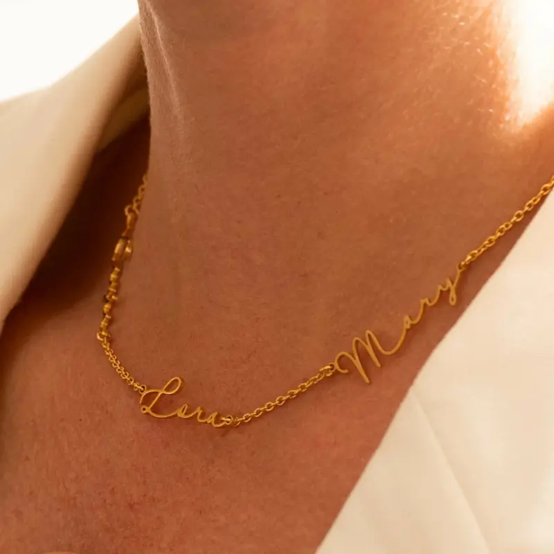 Gold name necklace with 'Believe' engraved in modern font on collarbone