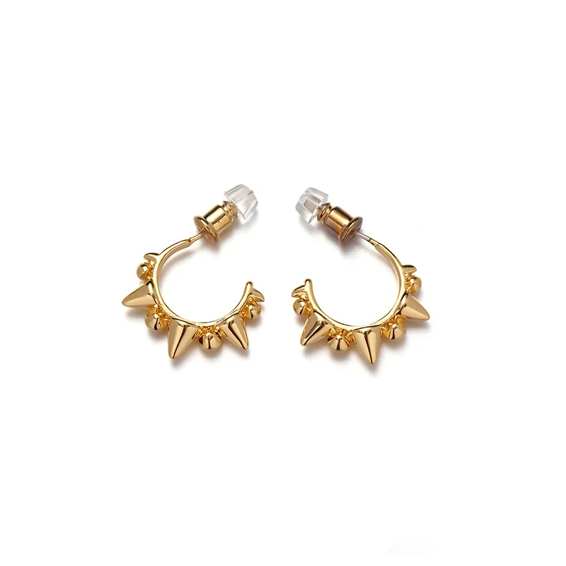 18K gold-plated adjustable heart ring with brilliant zirconia center, layered with minimalist bands on marble texture