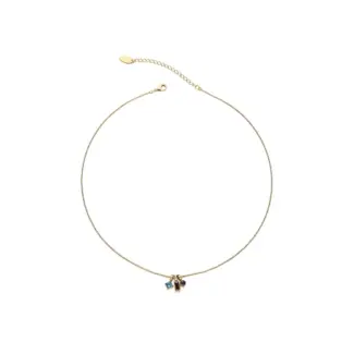 Woman wearing LIVKE multicolor zirconia necklace transitioning from office blazer to cocktail dress, showcasing prismatic jewelry for versatile styling