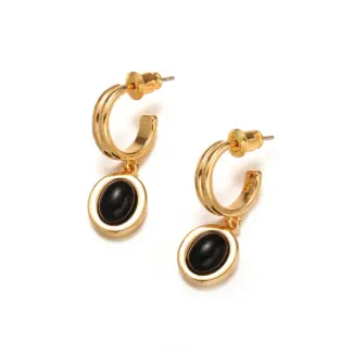 Layered 18K gold-plated tiger eye earrings with red/black/brown stone pendants on terrazzo backdrop, styled with leather cord necklaces