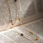 LIVKE gold-plated adjustable tri-bead necklace styled as double layers with minimalist pendants, showing day-to-night versatility
