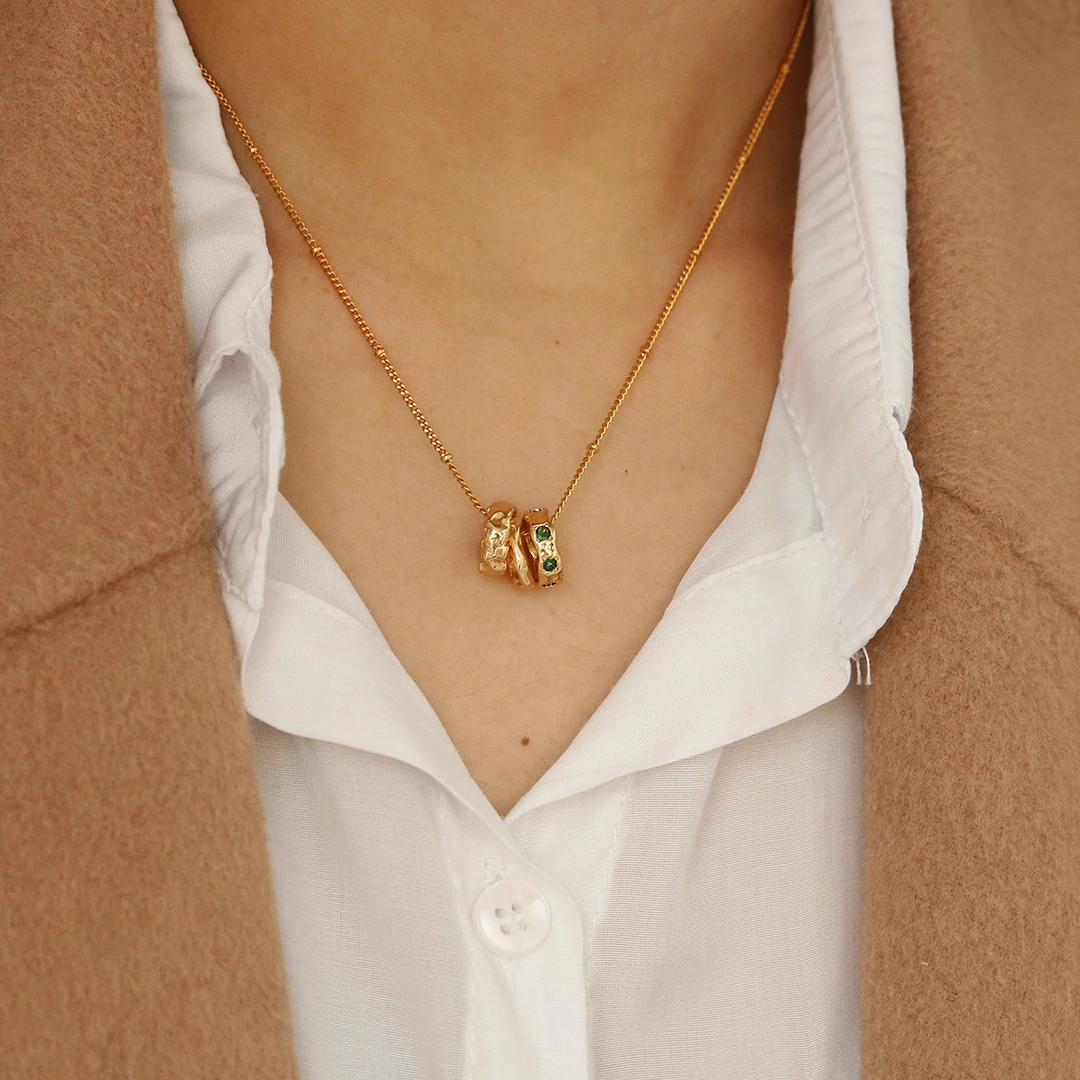 livke-triple-hoop-cz-necklace-4colors (2) Model wearing LIVKE emerald CZ triple hoop necklace with black turtleneck