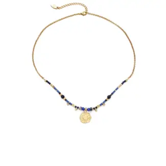 LIVKE’s gold-plated brass necklace featuring a lapis lazuli pendant, styled with a white linen blouse for effortless elegance.