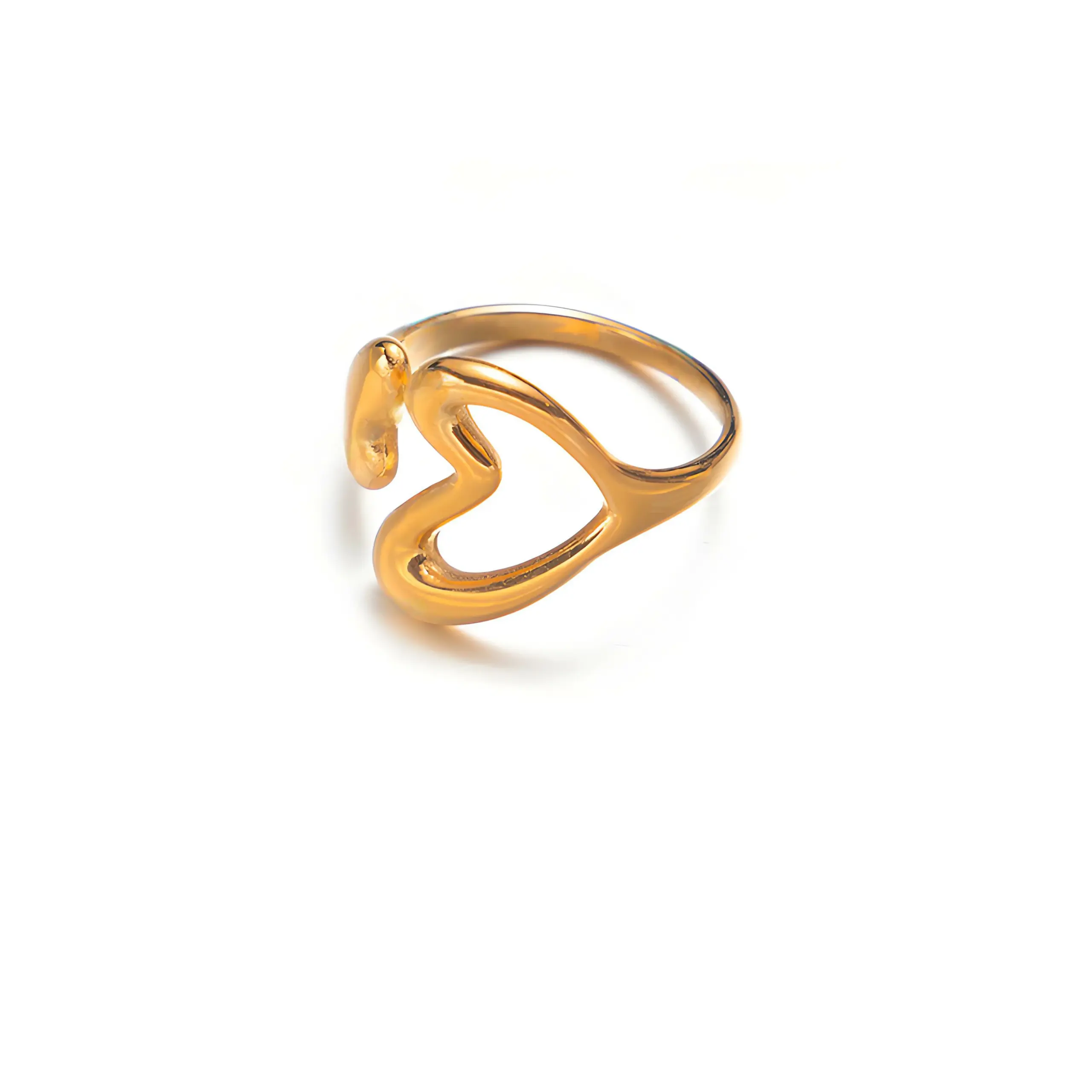 livke-vintage-love-signet-ring-cafe-style (7) Woman wearing LIVKE gold love signet ring while holding cappuccino in Parisian café, showcasing stackable jewelry styling