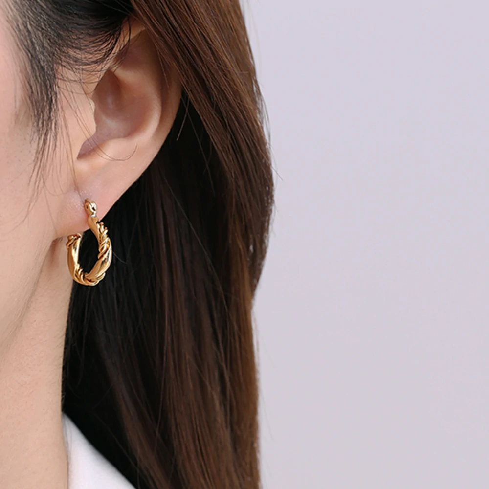 twisted-hoop-earrings-titanium Asymmetrical Titanium Hoops - Hypoallergenic Geometric Earrings for Sensitive Ears, Punk & Minimalist Style