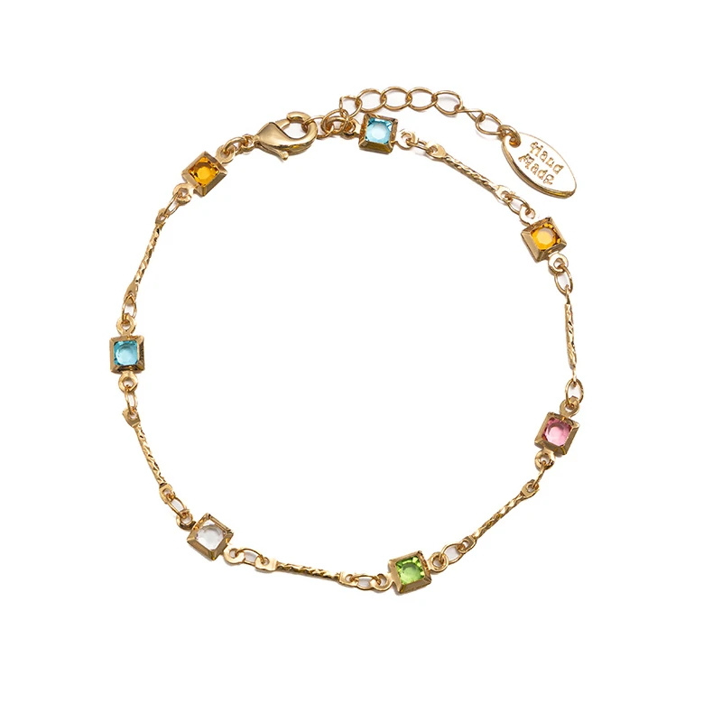 livke-prismatic-bracelet-bauhaus-minimalism (2) Delicate chain bracelet with six colorful square zirconia stones in Bauhaus-inspired geometric arrangement, perfect for minimalist jewelry lovers and modern gift ideas