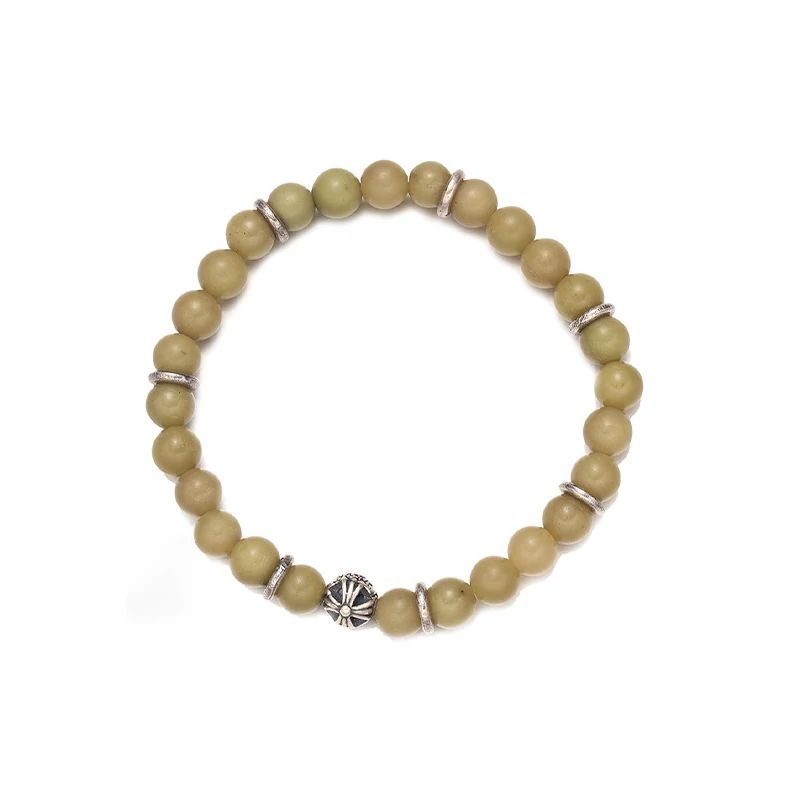 livke-sacred-forest-bracelet-energy-healing (3) Olive green aventurine bead bracelet with silver feather charm and floral spacer beads, designed for spiritual healing and crystal energy jewelry lovers